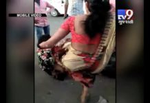 बीच सड़क पर पुलिस वाले ने की महिला के साथ छेड़छाड़ फाड़े कपड़े